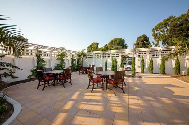 Outdoor patio area with seating at the facility
