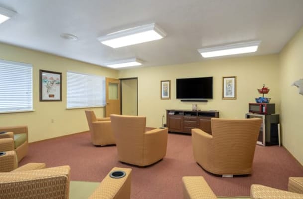 Common area with seating in a well-lit room
