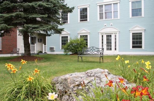 Flower garden and seating area outside the facility