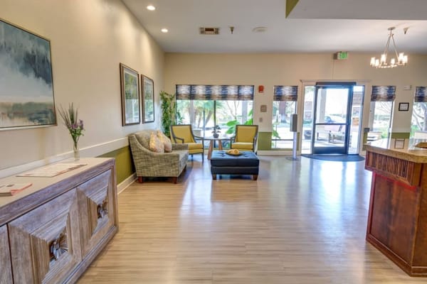 Bright lobby area with comfortable seating and large windows.