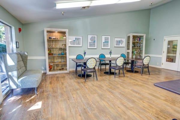 Bright and inviting dining area with tables and chairs