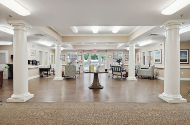 Spacious lobby with pillars and seating areas