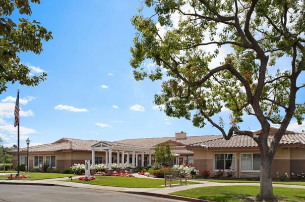 Exterior shot of Sunrise at Canyon Crest with landscaping and trees