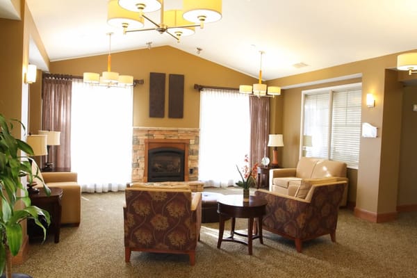 Inviting living room with comfortable seating and a fireplace