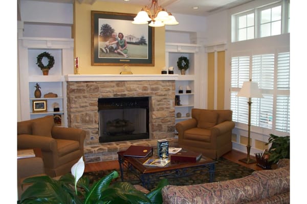 Comfortable living room with seating and fireplace