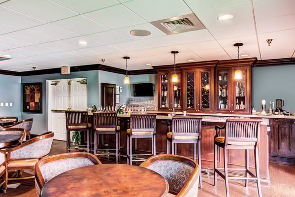 Interior bar area with seating and lighting
