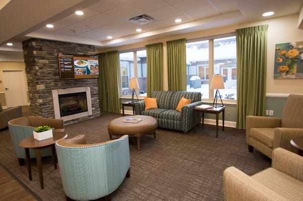 Interior view of a cozy common area with seating