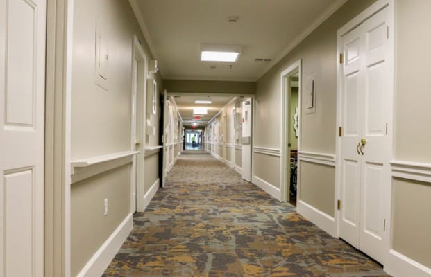 Long hallway with doors on both sides