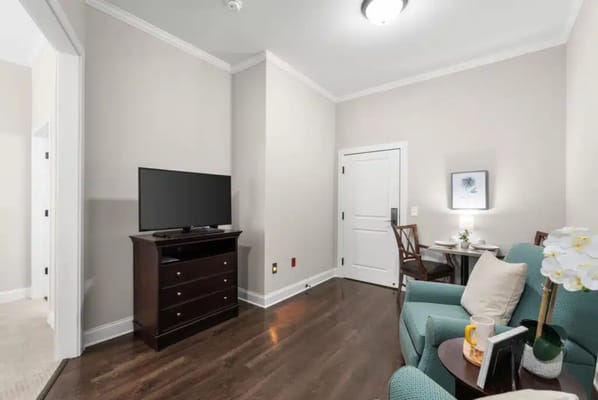 Cozy interior room with furniture and TV