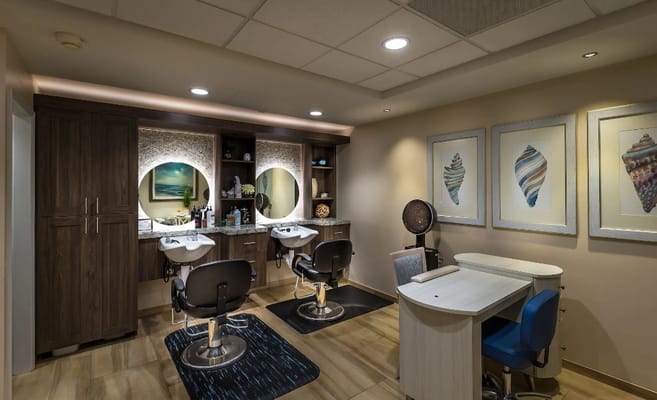 Modern beauty salon interior with styling chairs and mirrors