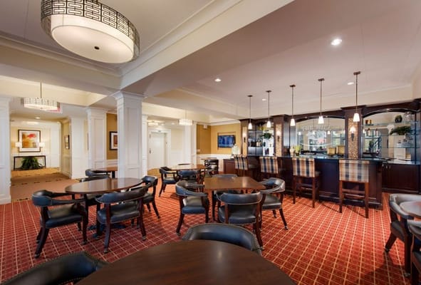 Interior common area with seating and a bar