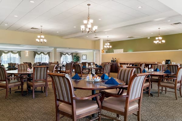 Interior dining room with tables and chairs set up