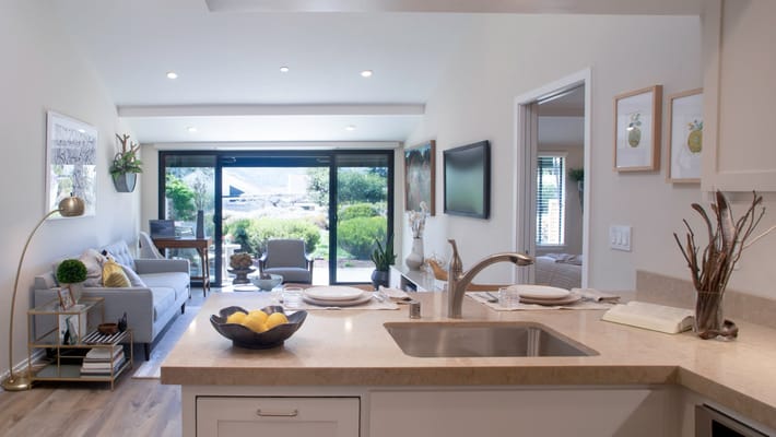 Bright interior view of a living space with a kitchen
