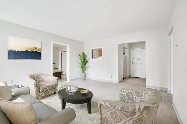 Bright and airy resident room with seating area