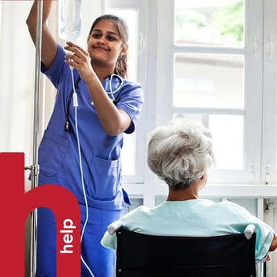 Nurse assisting a resident in a care facility
