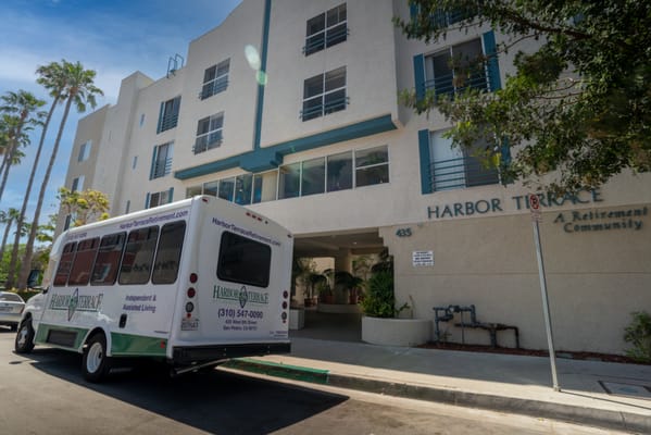 Exterior view of Harbor Terrace with facility vehicle