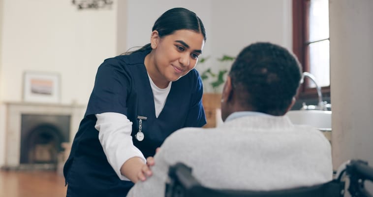 A caregiver interacting with a resident in a facility
