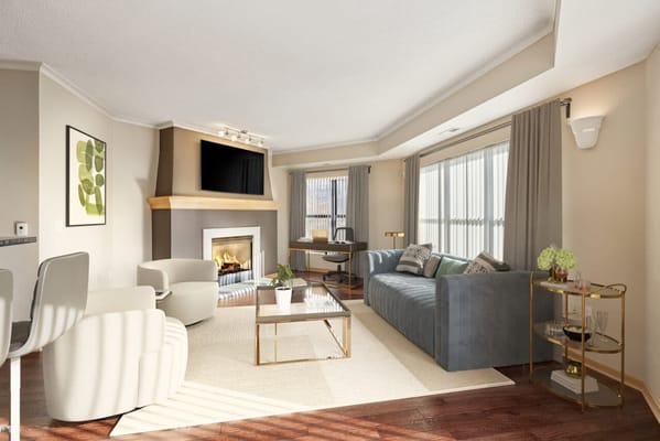 Bright common area with comfortable seating and fireplace