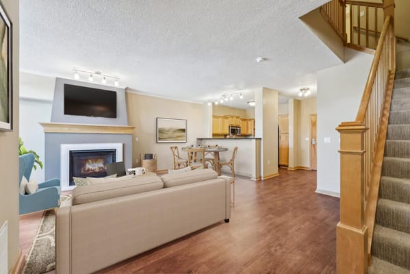 Bright and inviting common area with a fireplace