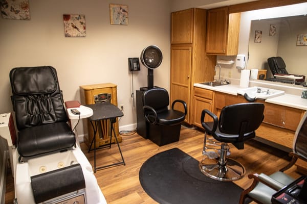 Salon area with styling chairs and equipment