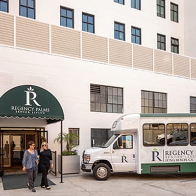 Residents arriving at Regency Palms with shuttle van