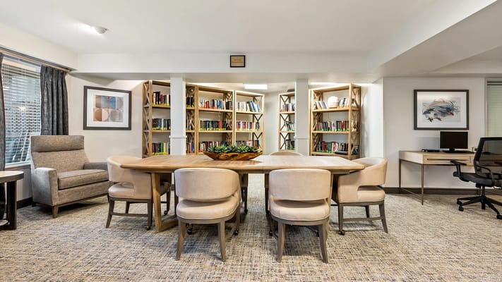 Interior common area with bookshelves and seating
