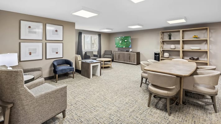 Bright common area with seating and tables