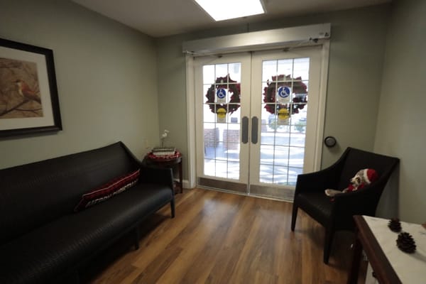 Seating area in the facility with holiday decorations