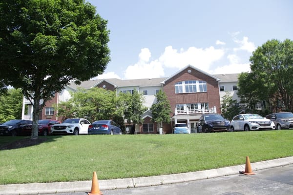 Exterior view of Brookdale Belle Meade with parking area