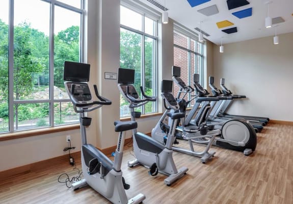 Fitness area with exercise machines and natural light