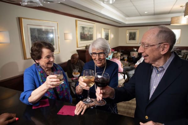 Residents enjoying drinks in a common area