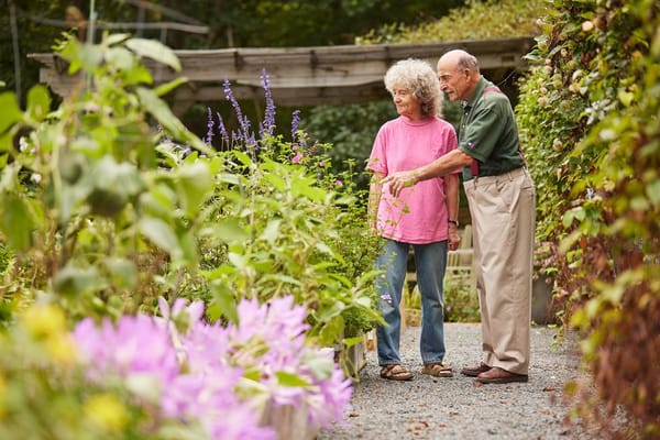 Two residents enjoying a garden together