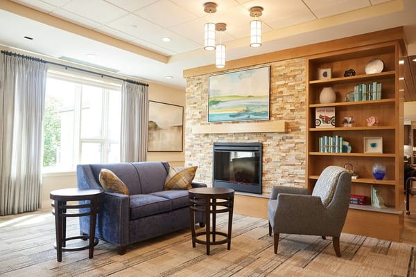 Cozy common area with seating and fireplace