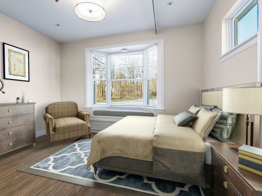 A well-furnished private resident room with natural light