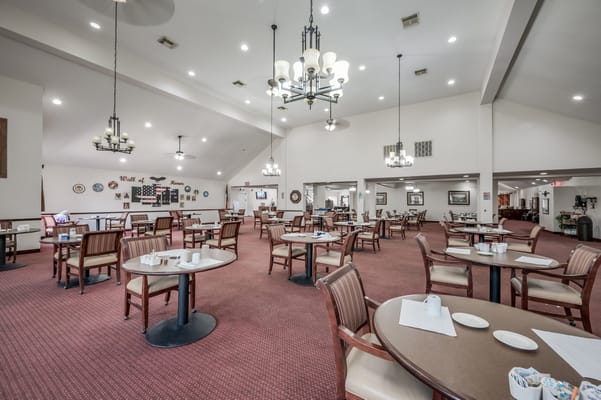 Dining room area with tables and chairs set up