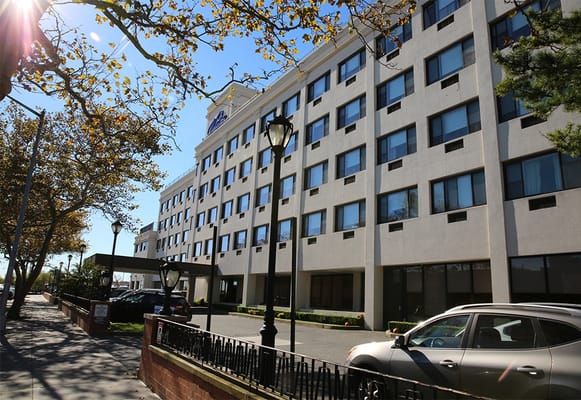 Exterior view of The Waterford on the Bay Senior Living building