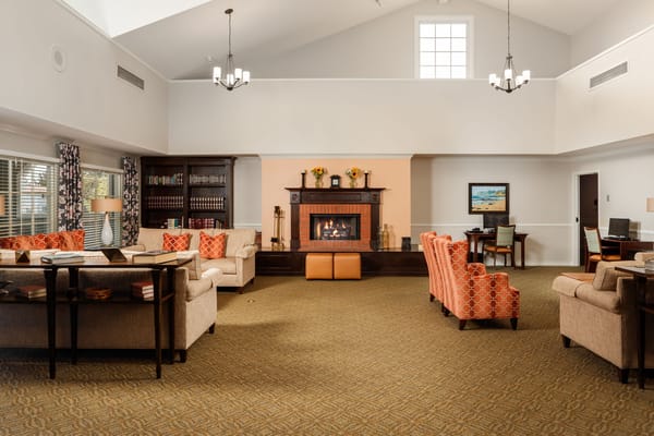 Common area with seating and a fireplace