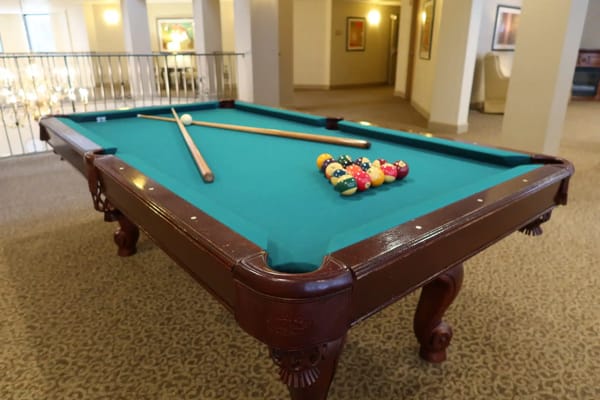 Pool table in a common area of the facility