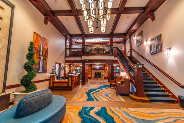 Interior view of a lobby with stairs and seating