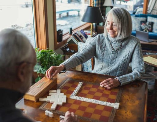 Residents playing a game in a common area