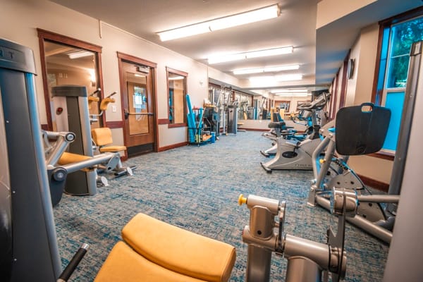 Interior view of a gym with exercise equipment