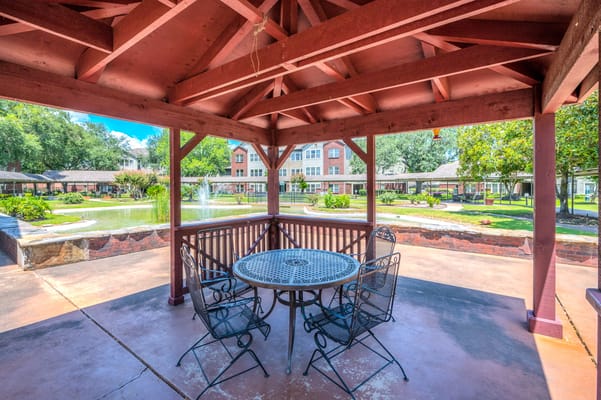 A gazebo in the outdoor area of a senior living facility
