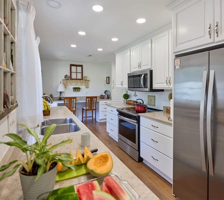 Well-equipped kitchen with fresh fruits displayed