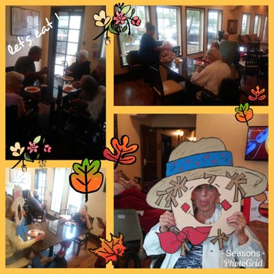 Residents enjoying a meal in a communal dining area
