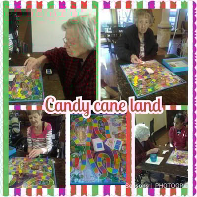 Residents engaged in a game of Candy Land