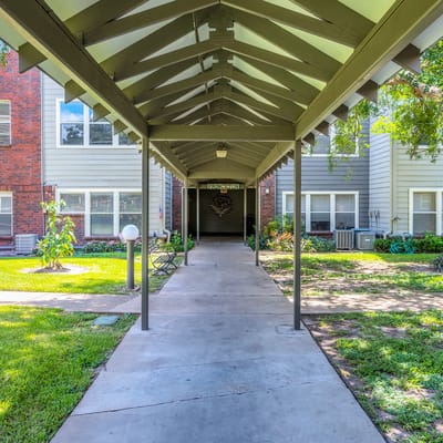 Pathway leading to a senior living building entrance