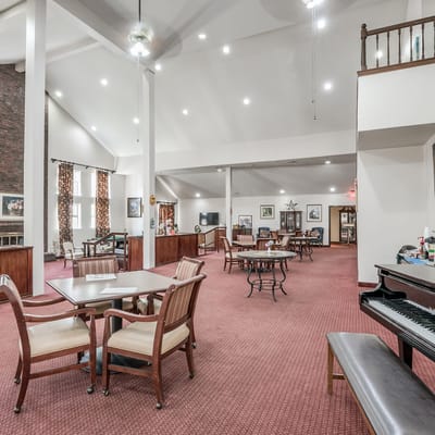 Bright common area with tables and chairs