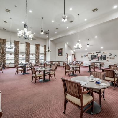 Bright dining room with tables and chairs
