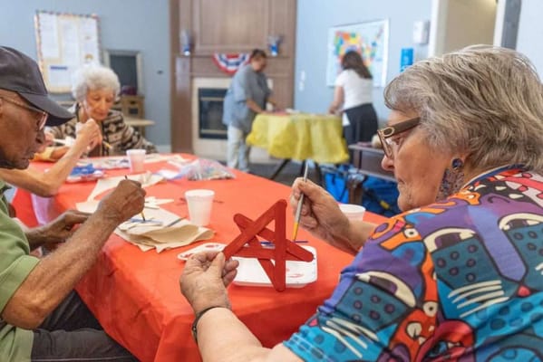 Residents participating in an arts and crafts activity