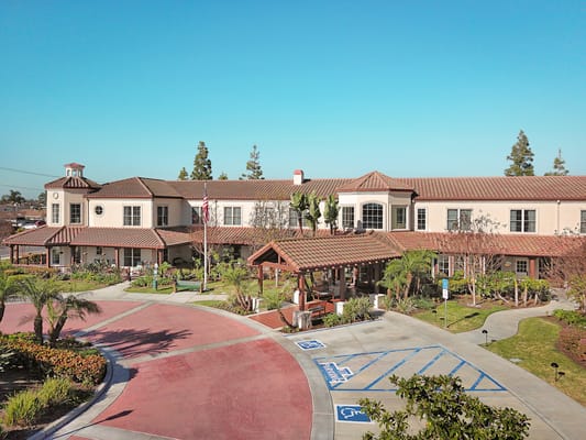 Exterior view of Ivy Park at La Palma with pathways and landscaping